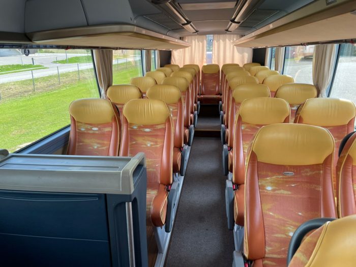 Picture shows Neoplan bus for rent from the inside