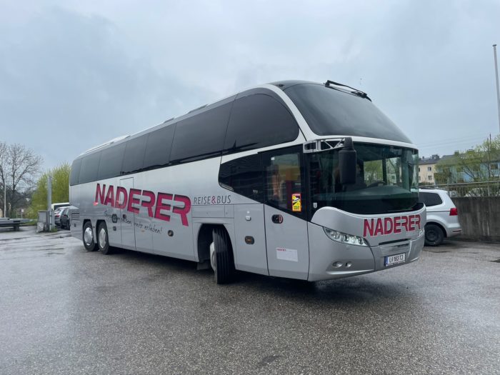 Picture shows Neoplan bus for rent from the outside